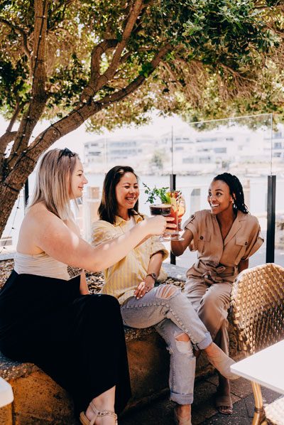 Guests enjoying drinks on the terrace at Mindarie Marina